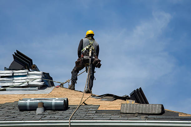 Professional Gutter Installation technician working in Corona, NY